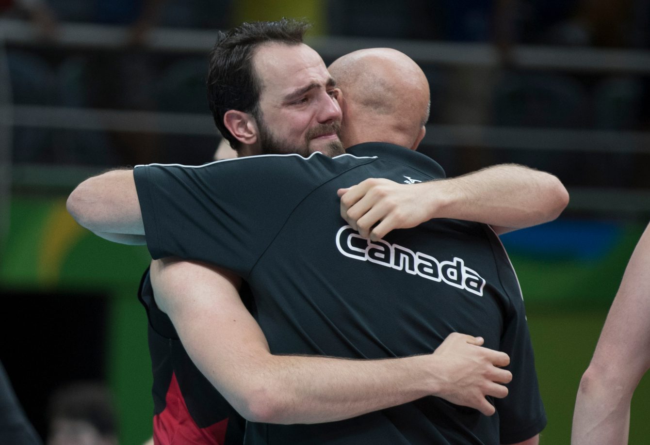 Emotional team Canada players hug family members and friends after losing their quarterfinal volleyball match to Russia at the Olympic games in Rio de Janeiro, Brazil, Wednesday, August 17, 2016. COC Photo/Jason Ransom