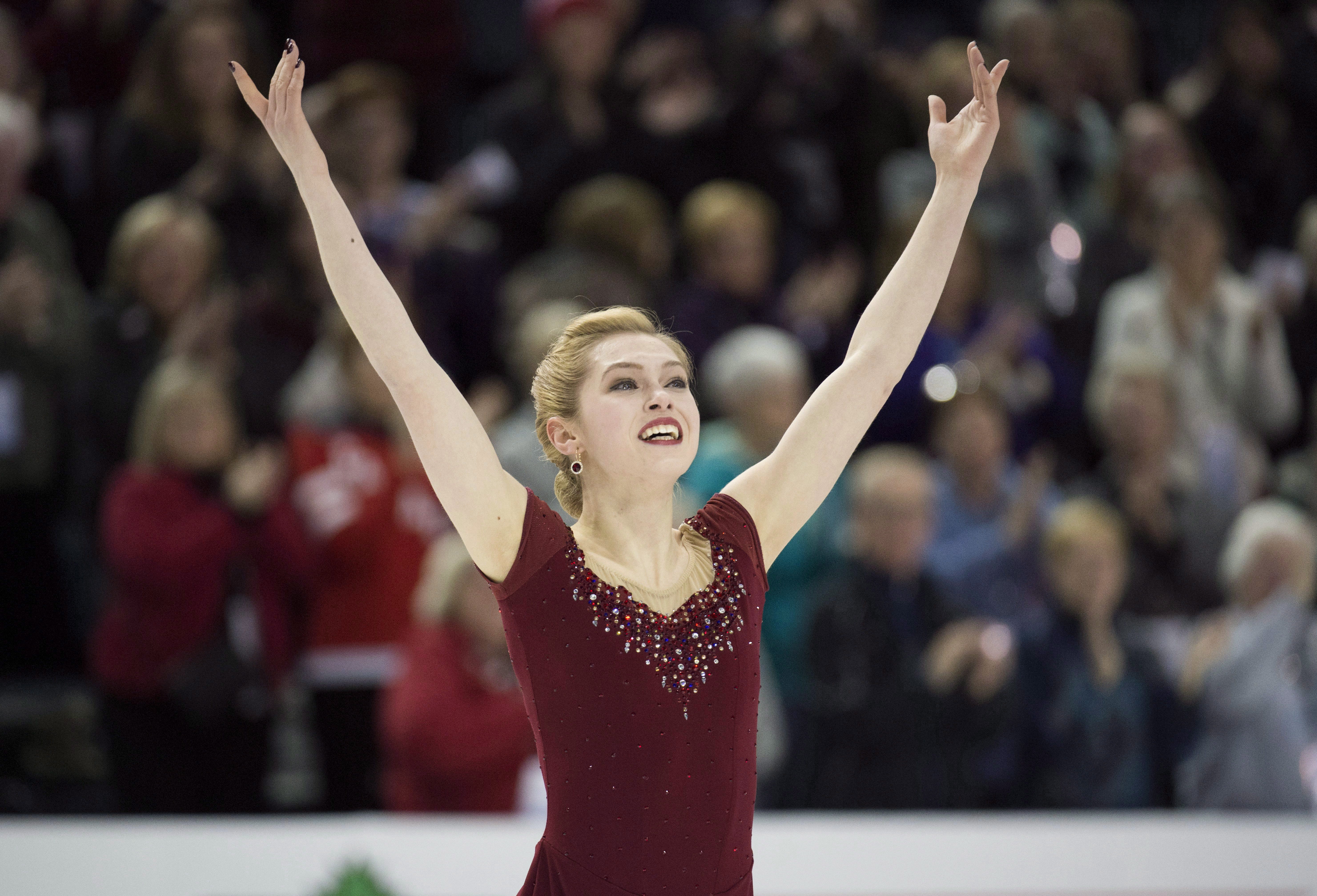 Alaine Chartrand acknowledges the crowd following her free program during the Canadian Figure Skating Championships in Halifax on Saturday, January 23, 2016. THE CANADIAN PRESS/Darren Calabrese