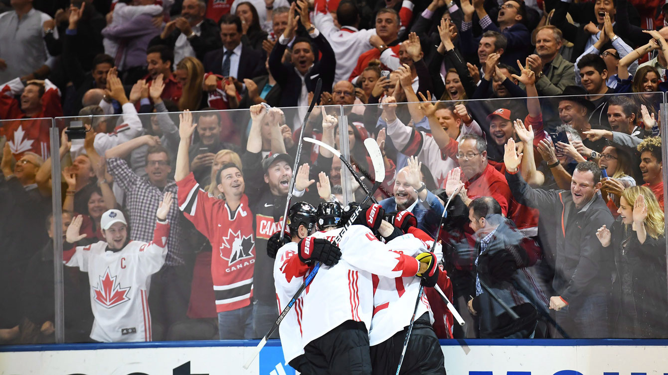 Canadian men celebrate during one of the gold medal finals at NHL's "World Cup of Hockey" in Toronto in September 2016.
