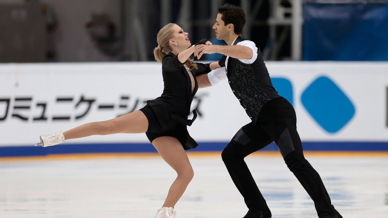 Kaitlyn Weaver and Andrew Poje skate their short dance at the Grand Prix event in Moscow Russia on Friday, Nov. 4, 2016. (AP Photo/Ivan Sekretarev)