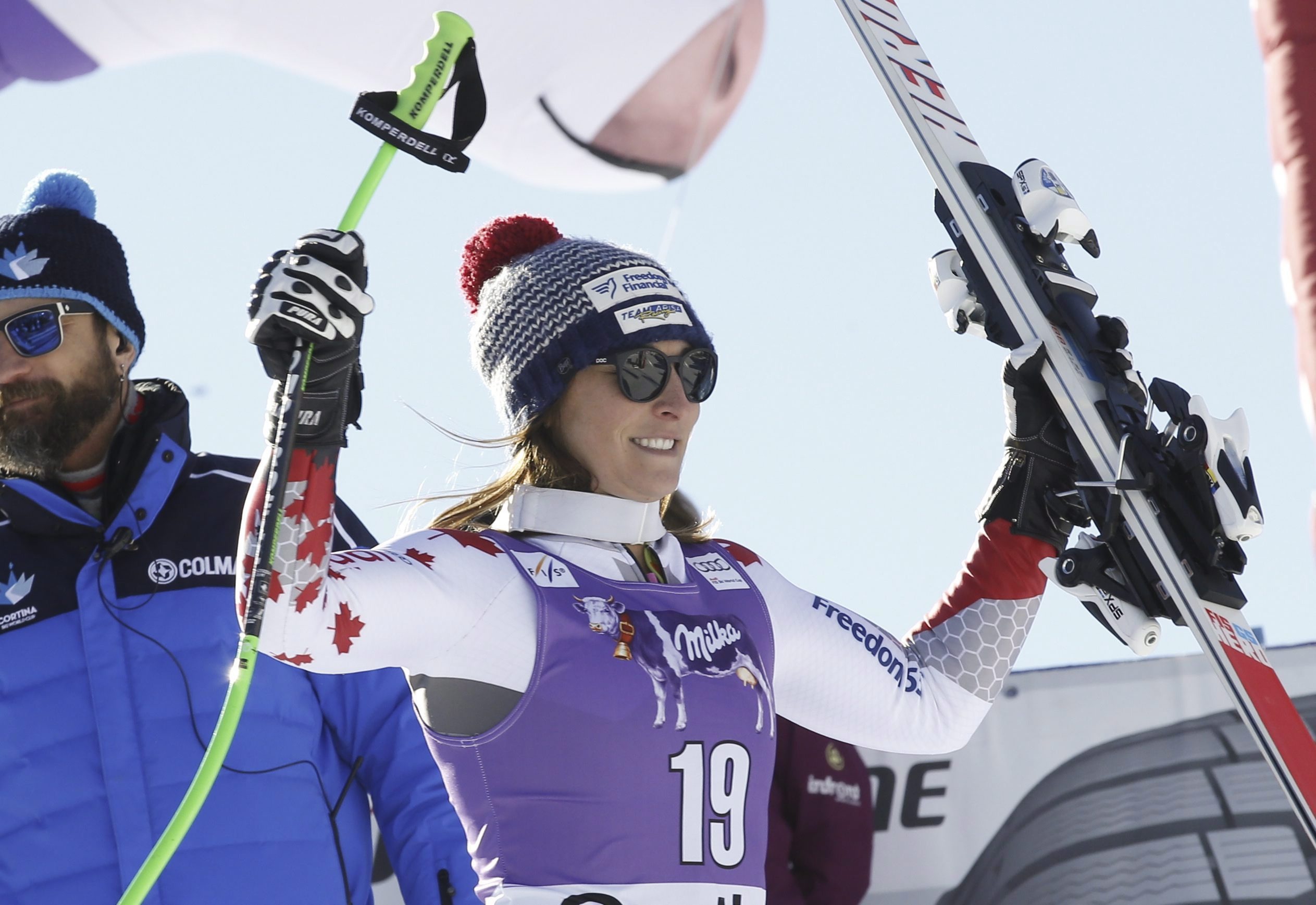 Canada's Larisa Yurkiw celebrates her second place after completing an alpine ski, women's World Cup downhill, in Cortina D'Ampezzo, Italy, Saturday, Jan. 23, 2016. (AP Photo/Armando Trovati)