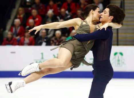 FIG Skate Canada 20161029 Canada's Tessa Virtue and Scott Moir perform in the Ice Dance Free Skating Program during the 2016 Skate Canada International competition in Mississauga, Ont., on Saturday, October 29, 2016. THE CANADIAN PRESS/Mark Blinch