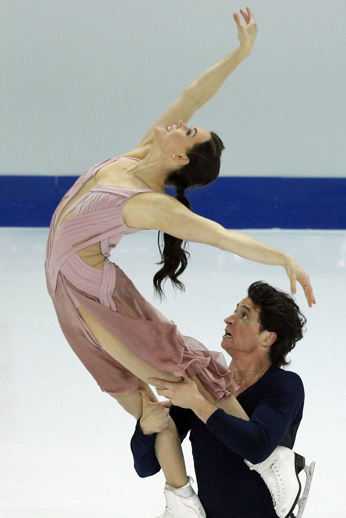 Tessa Virtue and Scott Moir of Canada compete in the Ice Dance Free Dance Program during ISU Grand Prix of Figure Skating Final in Marseille, southern France, Saturday, Dec. 10, 2016. (AP Photo/Christophe Ena)
