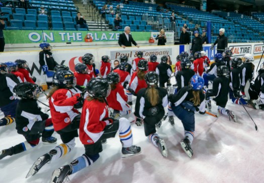 Teck Coaching Series Botterill, Turco, Renney Tom Renney, Jennifer Botterill and Marty Turco speak to the young players participating in the Teck Coaching Series in Kamloops, BC on December 3, 2016 (photo: Allen Douglas)