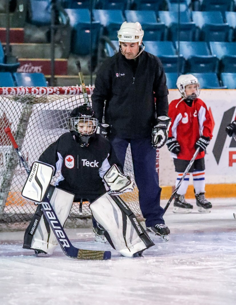 teck-olympic-hockey_9634 Marty Turco tutors a young goaltender at the Teck Coaching Series in Kamloops, BC on December 3, 2016 Photo: Allen Douglas