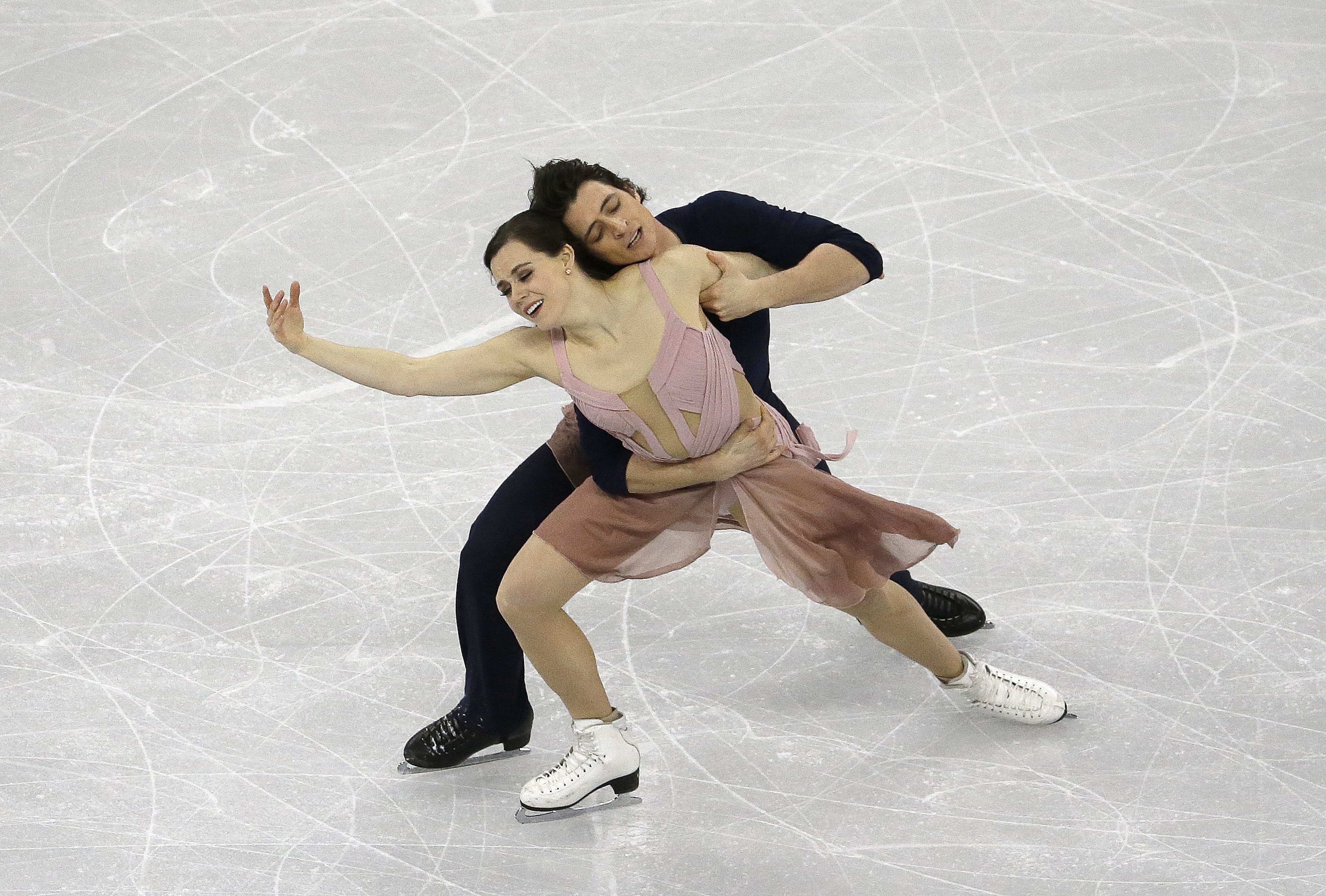 Gold medalists Tessa Virtue and Scott Moir of Canada perform in the Ice Dance Free Dance at the ISU Four Continents Figure Skating Championships in Gangneung, South Korea, Friday, Feb. 17, 2017. (AP Photo/Ahn Young-joon)