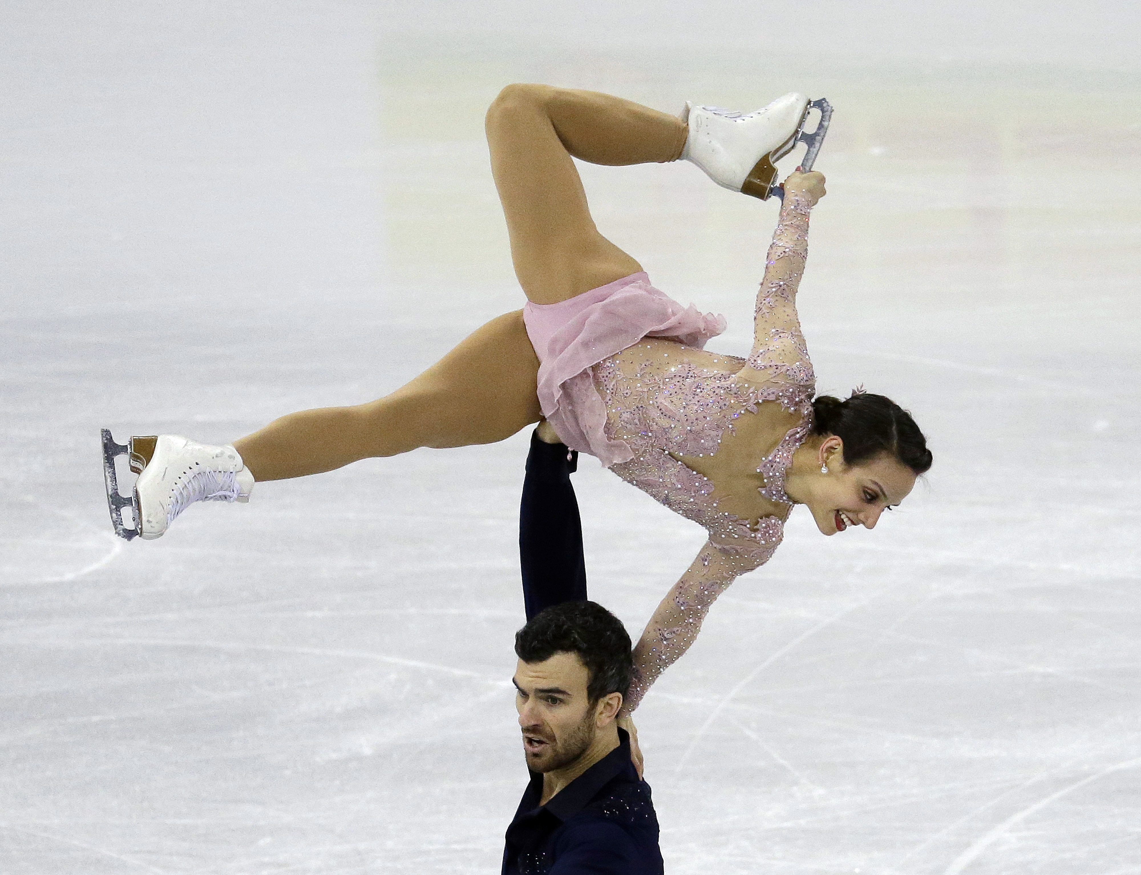 Silver medalists Meagan Duhamel and Eric Radford of Canada perform in the Pairs Free Skating at the ISU Four Continents Figure Skating Championships in Gangneung, South Korea, Saturday, Feb. 18, 2017. (AP Photo/Ahn Young-joon)