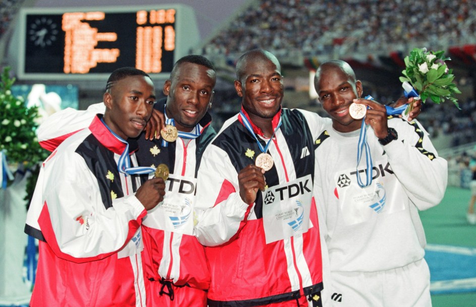 CanadaRelayAthens97-001 Robert Esmie, Bruny Surin, Glenroy Gilbert and Donovan Bailey with their 4x100m relay gold medals from the 1997 IAAF World Championships in Athens Photo: Claus Andersen
