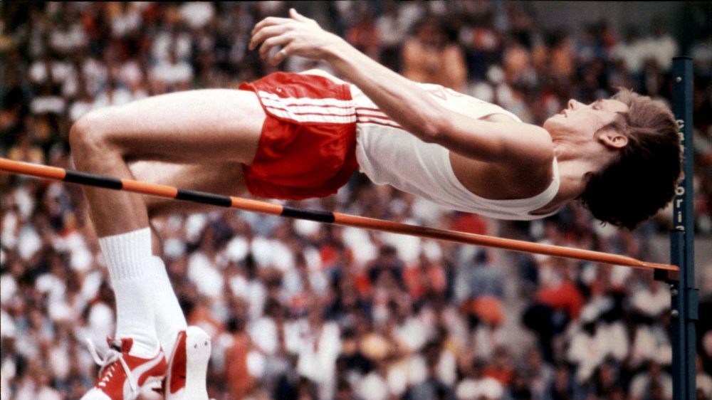 Greg Joy of Vancouver clears the high jump during Olympic finals competition Aug. 11, 1976 in Montreal. Greg Joy calls carrying the Canadian flag at the closing ceremony of the 1976 Montreal Olympics "one of the highlights of my life."  THE CANADIAN PRESS/AP, Fred Chartrand