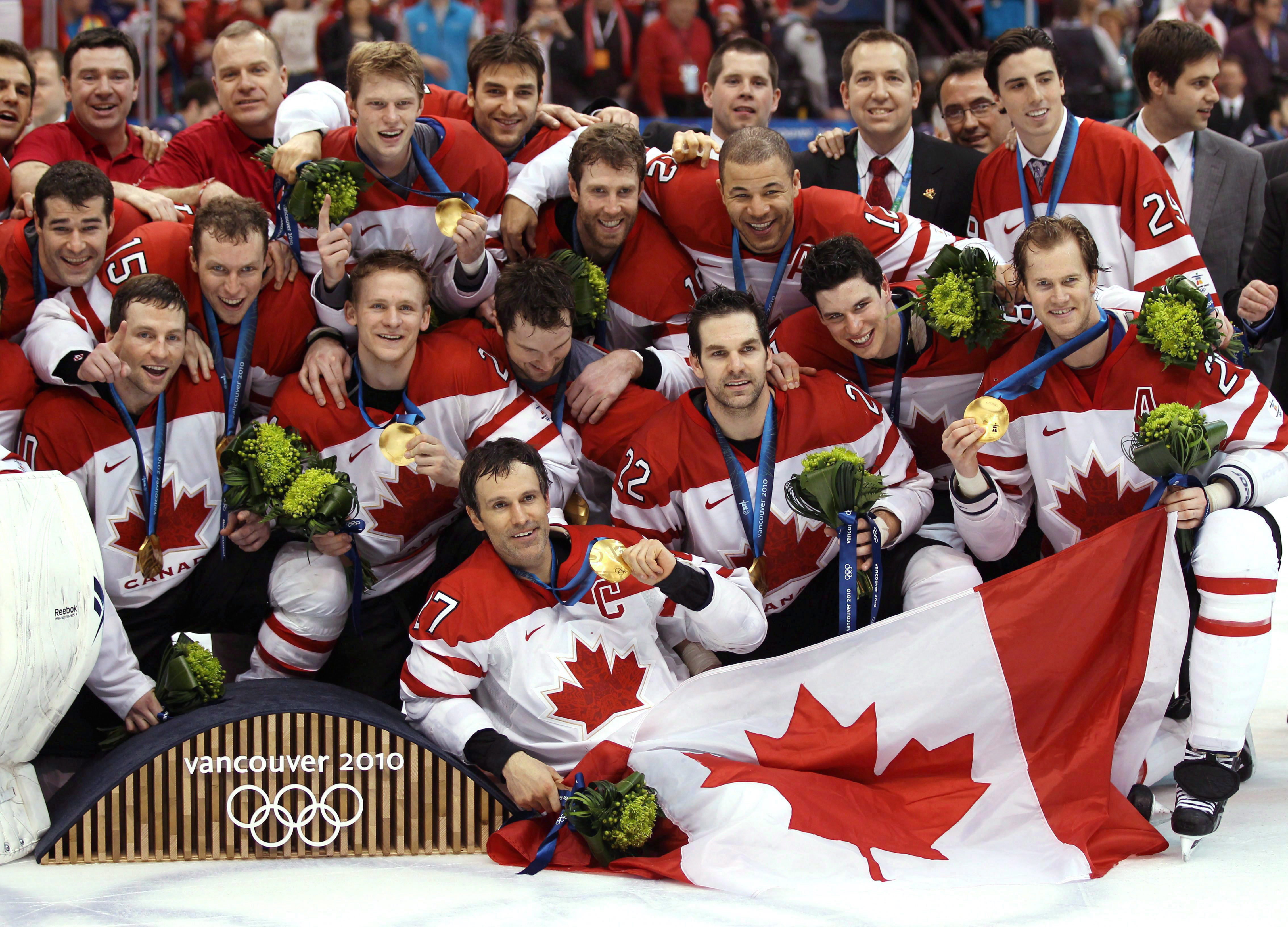 Team Canada poses for a photo after winning the gold medal game against the USA in the men's ice hockey gold medal final at the 2010 Winter Olympic Games in Vancouver, Sunday, Feb. 28, 2010. The Canadians have been on a remarkable tear in the nearly seven years since, winners now of 16 straight games and three straight best-on-best tournaments, including two Olympic gold medals and the 2016 World Cup. THE CANADIAN PRESS/Jonathan Hayward
