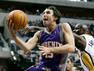 Phoenix Suns guard Steve Nash of Canada, left, puts up a shot against Indiana Pacers' Darrell Armstrong during the first quarter of an NBA basketball game in Indianapolis, in this Feb. 27, 2007 file photo. (AP Photo/Darron Cummings)