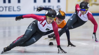 Short track skaters turning