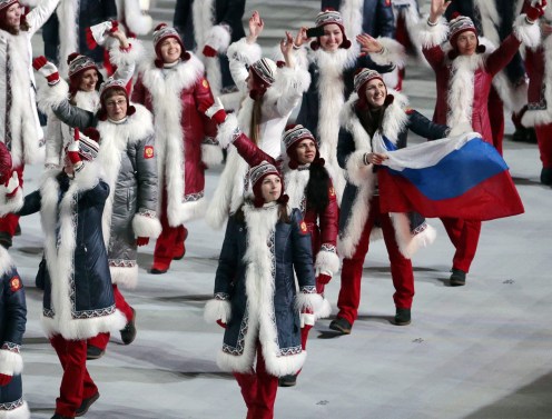 The team from Russia arrive during the opening ceremony of the 2014 Olympic Winter Games in Sochi, Russia, Friday, Feb. 7, 2014. (AP Photo/Ivan Sekretarev)