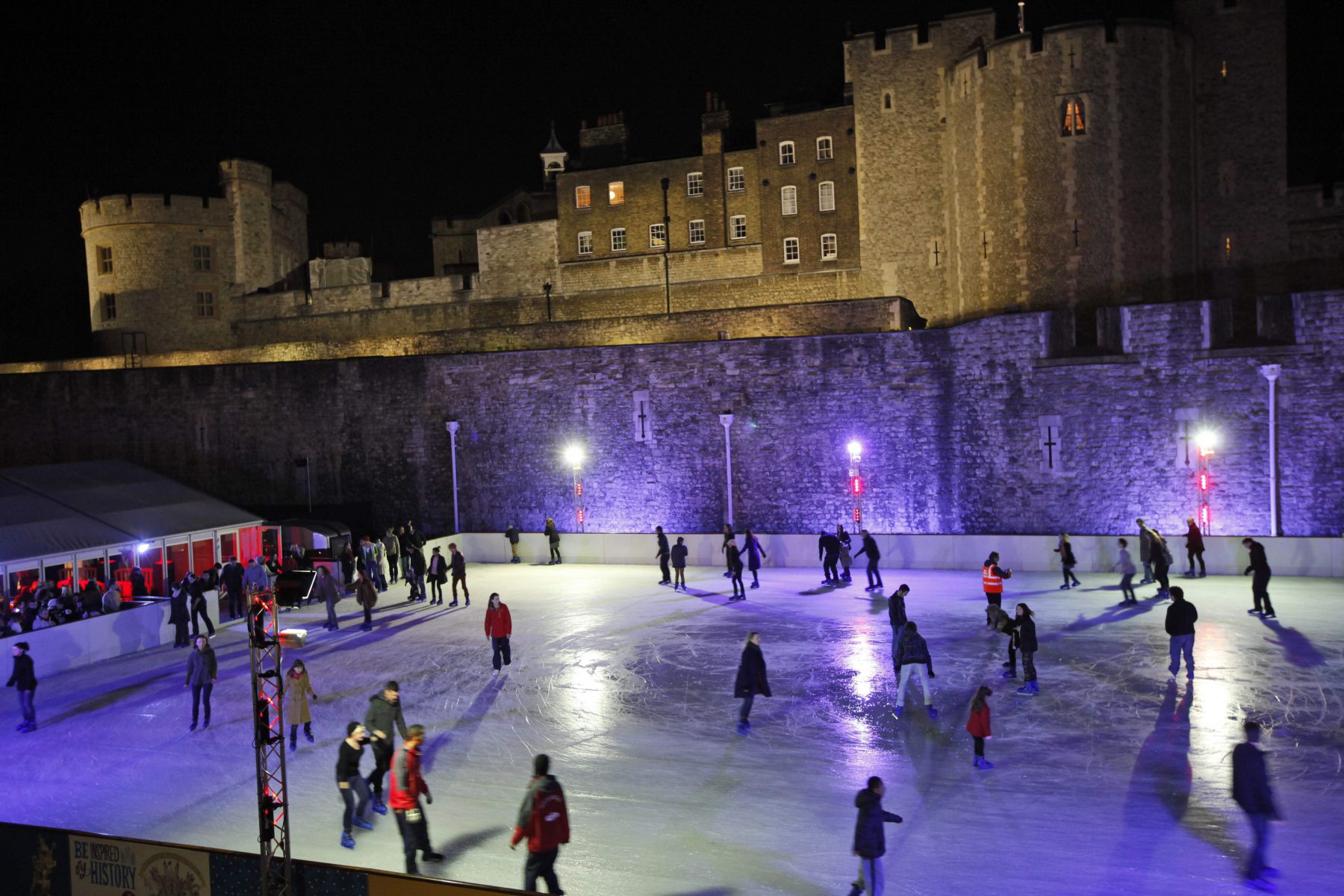 Skaters enjoy playing on the ice rink which has been set up in the moat area in the shadows of the iconic Tower of London, Friday, Nov. 18, 2011. The Tower of London has nearly one thousand years of history as a London fortress, and now plays host to modern families playing on the winter ice rink. (AP Photo/Lefteris Pitarakis)
