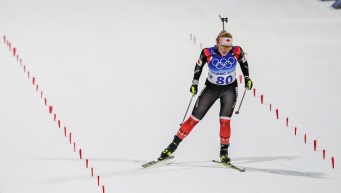 Sarah Beaudry skis towards the finish in a biathlon race