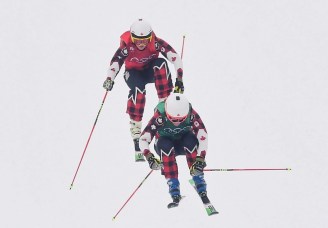 Canadians Kelsey Serwa, top, and Brittany Phelan compete in the women's ski cross semifinal at the Phoenix Snow Park at the 2018 Winter Olympic Games in Pyeongchang, South Korea, Friday, Feb. 23, 2018. THE CANADIAN PRESS/Jonathan Hayward