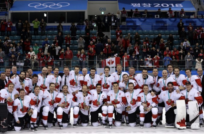 Pyeongchang Olympics Ice Hockey Men Canada hockey team celebrate with their bronze medals after beating the Czech Republic in the men's bronze medal hockey game at the 2018 Winter Olympics in Gangneung, South Korea, Saturday, Feb. 24, 2018. (AP Photo/Matt Slocum)