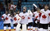 Goalie Kevin Poulin (31), of Canada, celebrates after the men's bronze medal hockey game against the Czech Republic at the 2018 Winter Olympics in Gangneung, South Korea, Saturday, Feb. 24, 2018. Canada won 6-4. (AP Photo/Matt Slocum)
