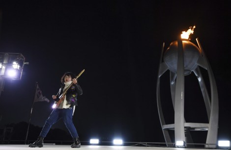 Thirteen-year-old guitarist Yang Tae-hwan plays a variation on 'Winter' from Vivaldi's The Four Seasons, during the closing ceremony of the 2018 Winter Olympics in Pyeongchang, South Korea, Sunday, Feb. 25, 2018. (Christof Stache/Pool Photo via AP)