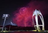 Pyeongchang Olympics Closing Ceremony Fireworks explode near the Olympic cauldron after the flame was extinguished at the conclusion of the closing ceremony of the 2018 Winter Olympics in Pyeongchang, South Korea, Sunday, Feb. 25, 2018. (Florien Choblet/Pool Photo via AP)