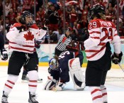 Meghan Agosta, Marie-Philip Poulin, Jessie Vetter Meghan Agosta celebrates with Marie-Philip Poulin