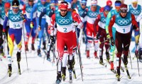 Alex Harvey leads out in front of the pack at the start of the 50km cross-country race at PyeongChang 2018 (CP).