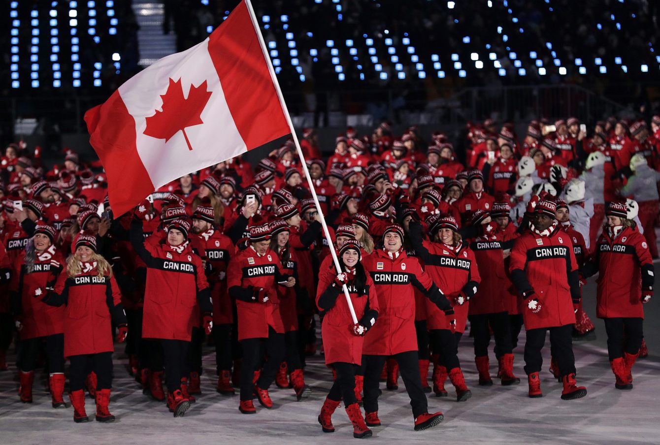 Tessa Virtue and Scott Moir lead Team Canada into the stadium during the Opening Ceremony of the Pyeonchang Winter Olympics in Pyeongchang, South Korea on February 9, 2018. Photo by Jason Ransom/COC