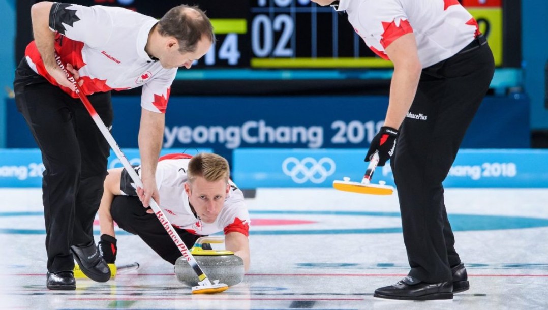 Canada curling team competing