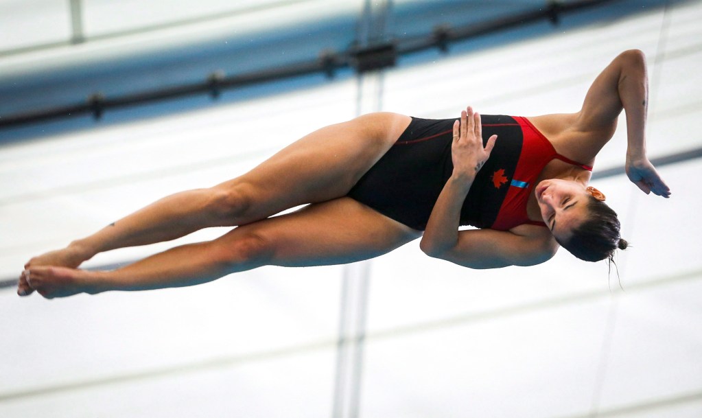 Pamela Ware mid air in dive