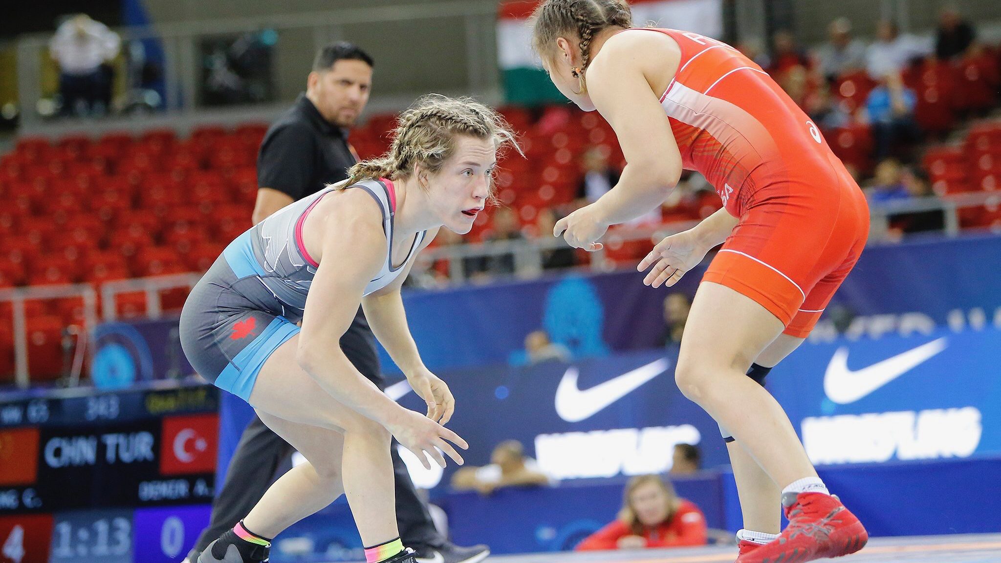 Two women wrestlers about to start a match