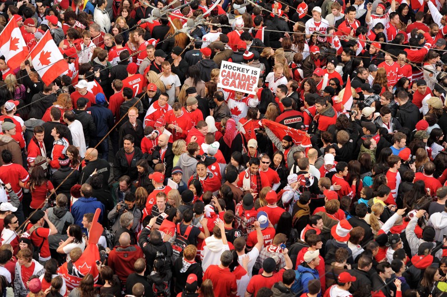 Thousands of jubilant Canadian hockey fans celebrate Canada's 3 -2 overtime gold medal hockey victory at the corner of Robson and Granville Streets in downtown Vancouver Sunday, Feb.28, 2010 at the 2010 Olympic Winter Games in Vancouver.THE CANADIAN PRESS/Scott Gardner