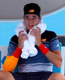 Milos Raonic cooling down with an ice necklace at the 2016 Australian Open. (AP Photo/Aaron Favila)