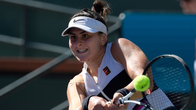 Bianca Andreescu returns the ball