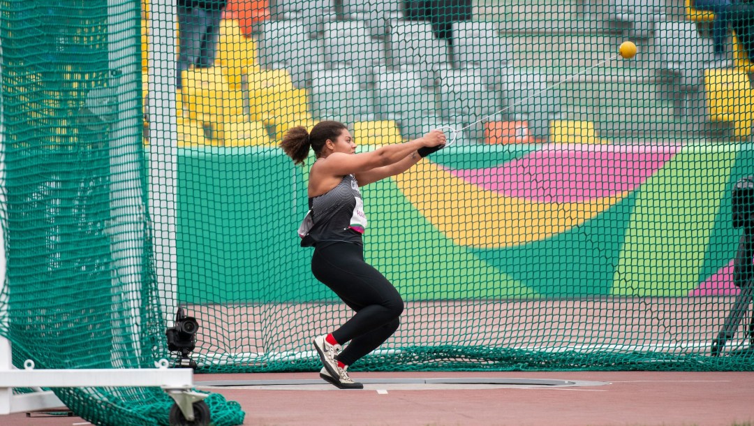 Camryn Rogers spinning in hammer throw circle
