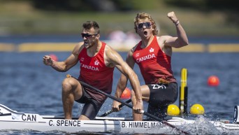 Craig Spence and teammate celebrate post-race