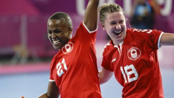Two Canadian handball players smiling