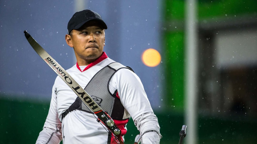 Archery athlete preparing to compete