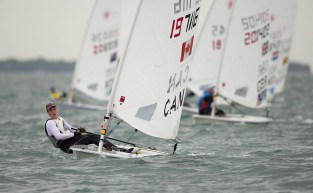 Alexander Heinzemann, from Canada, leads a pack of laser sail boats in Miami