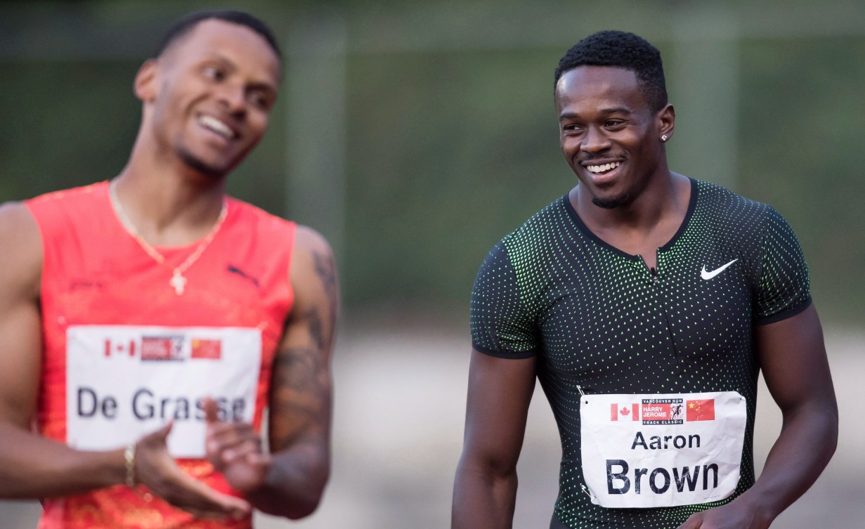 Aaron Brown and Andre De Grasse laugh together