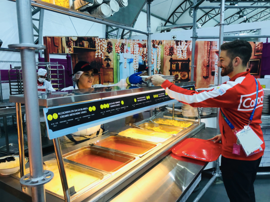 Team Canada athlete grabbing some food at the cafeteria