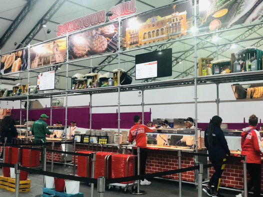 Athletes enjoying some food at the cafeteria