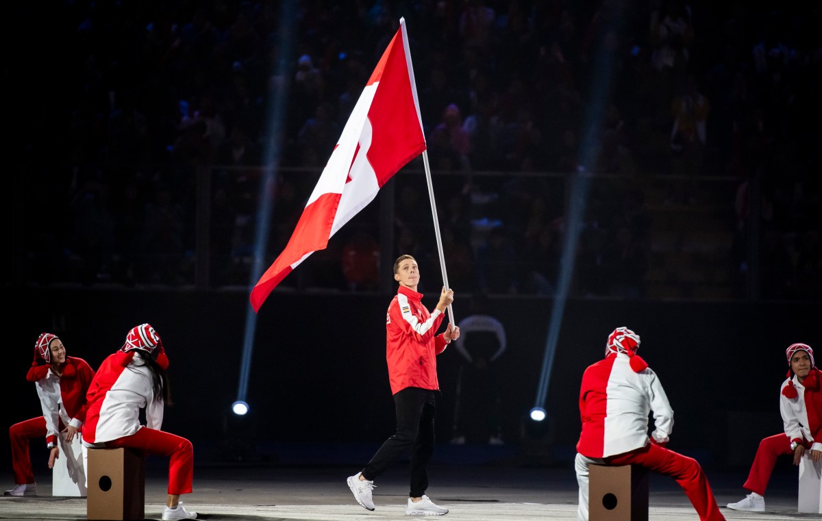 Scott Tupper waving flag