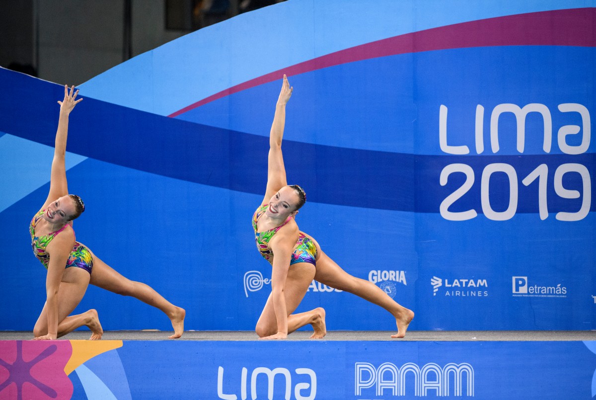 Claudia Holzner and Jacqueline Simoneau get ready for their routine