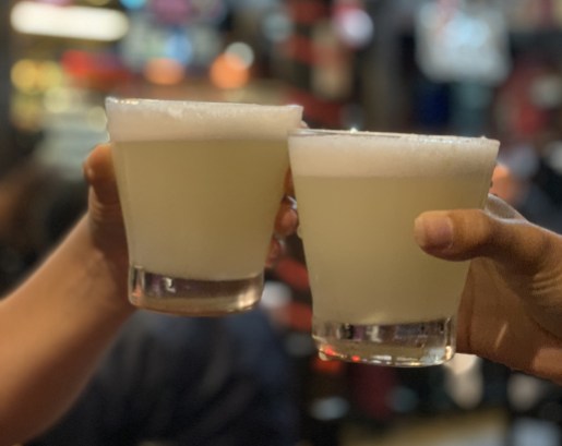 Pisco Sour- Peru Green/yellow drink with foamy egg whites on top
