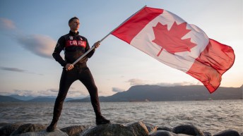 Scott Tupper holding Canadian flag