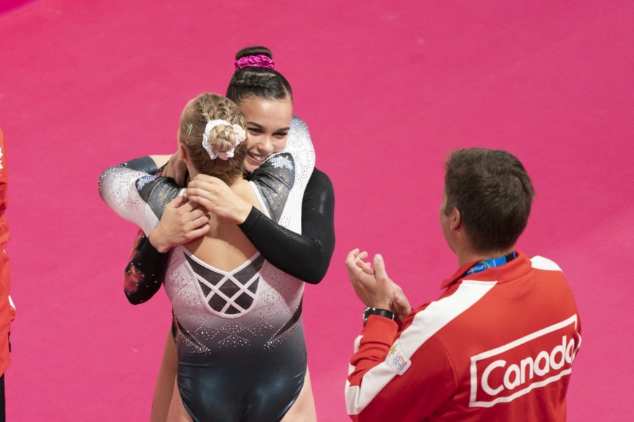 Brooklyn C. Moors hugs Ellie Black