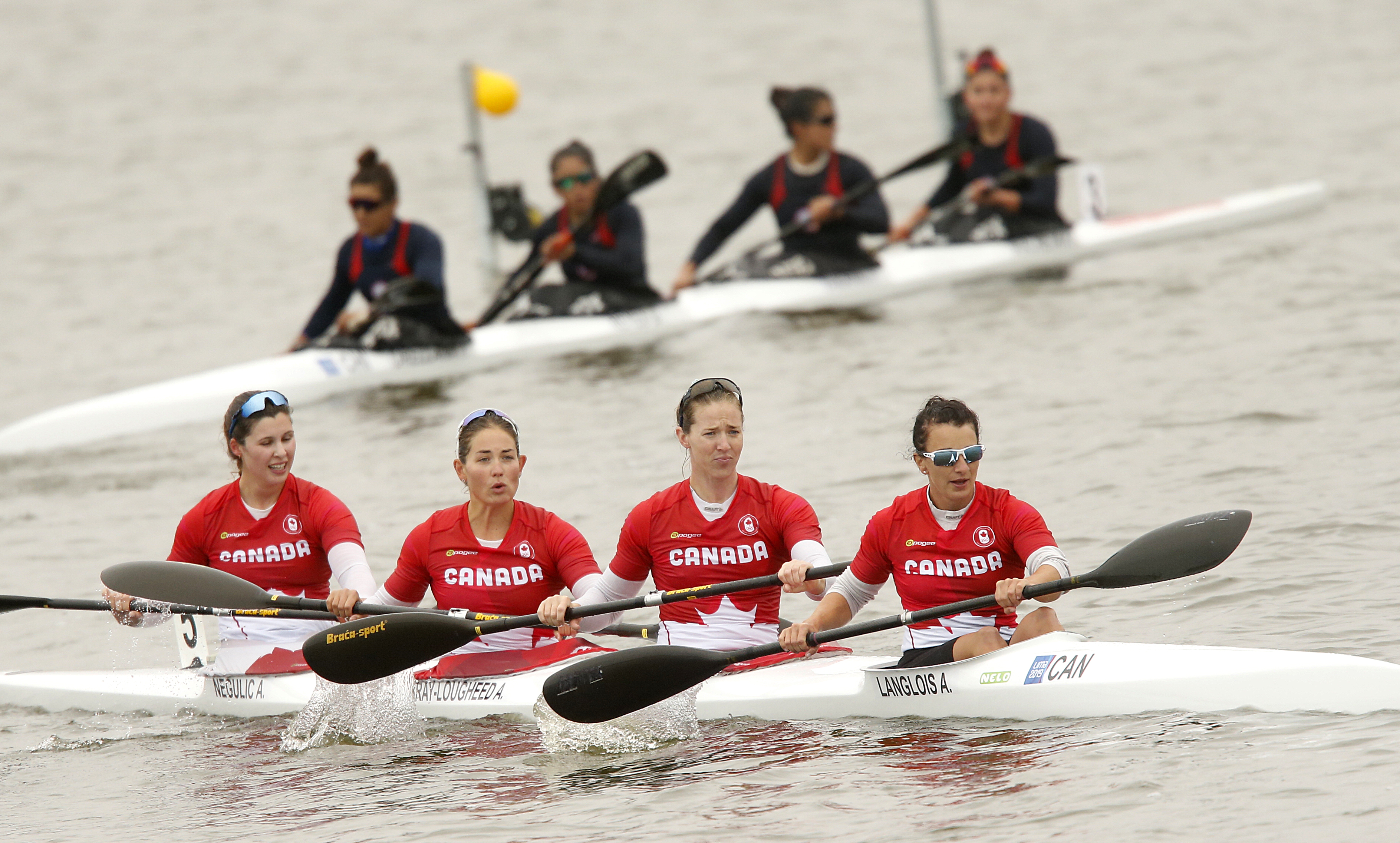 Canadian kayakers in boat on the water