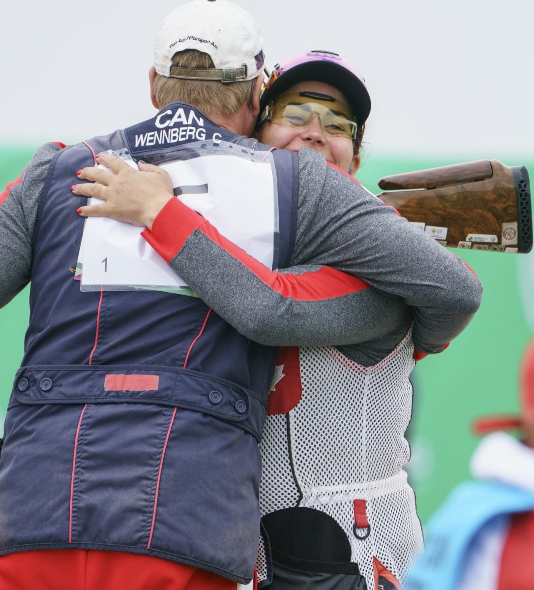 Amanda Chudoba and Curtis Wennberg hug