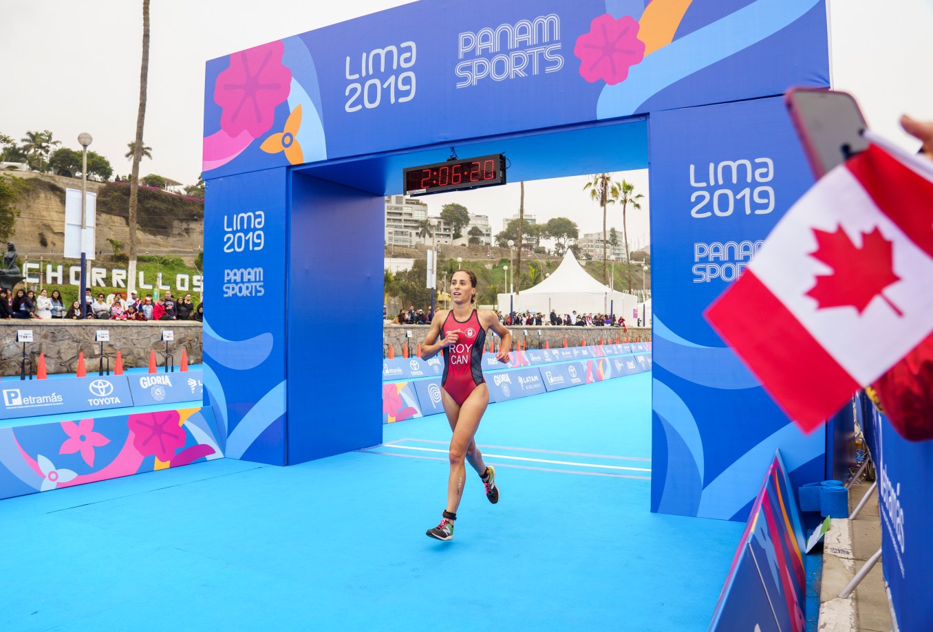 athlete crosses the finish line