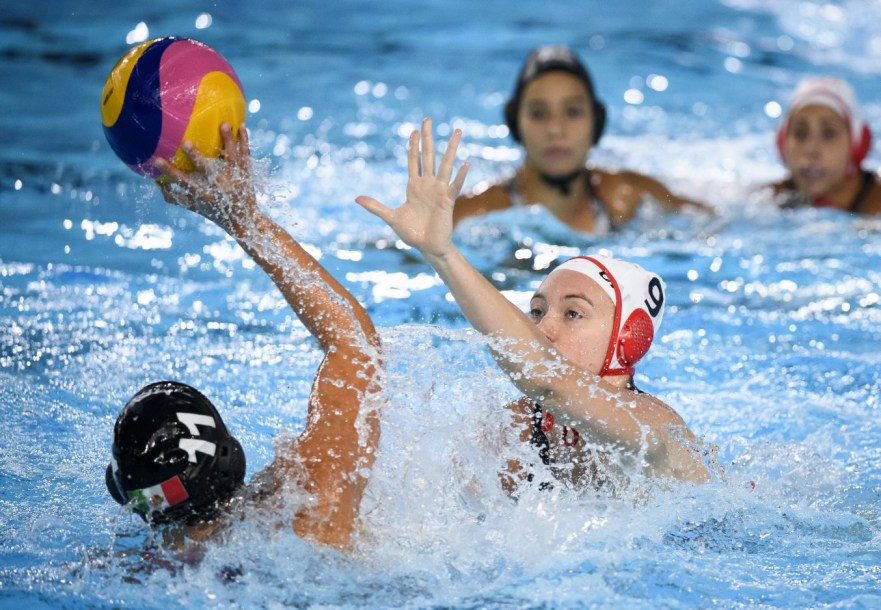 Hayley McKelvery of Canada attempts to block a pass